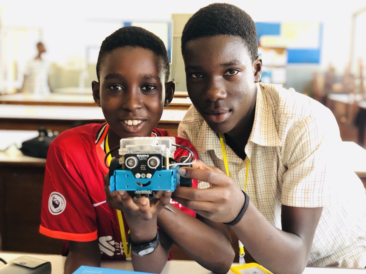Students assembling mBot robots