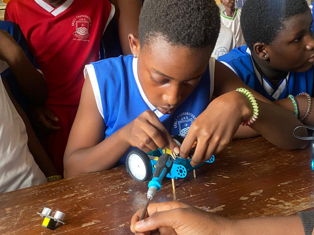 Student assembling mBot at Grace Prep Robotics Bootcamp