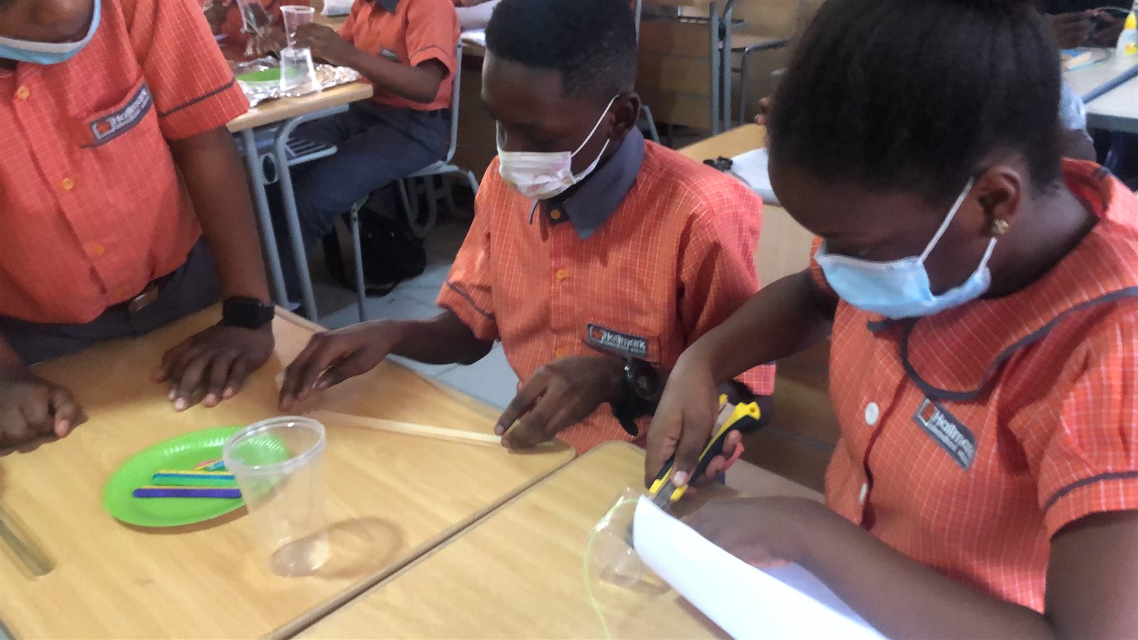 Students building prototypes with simple materials
