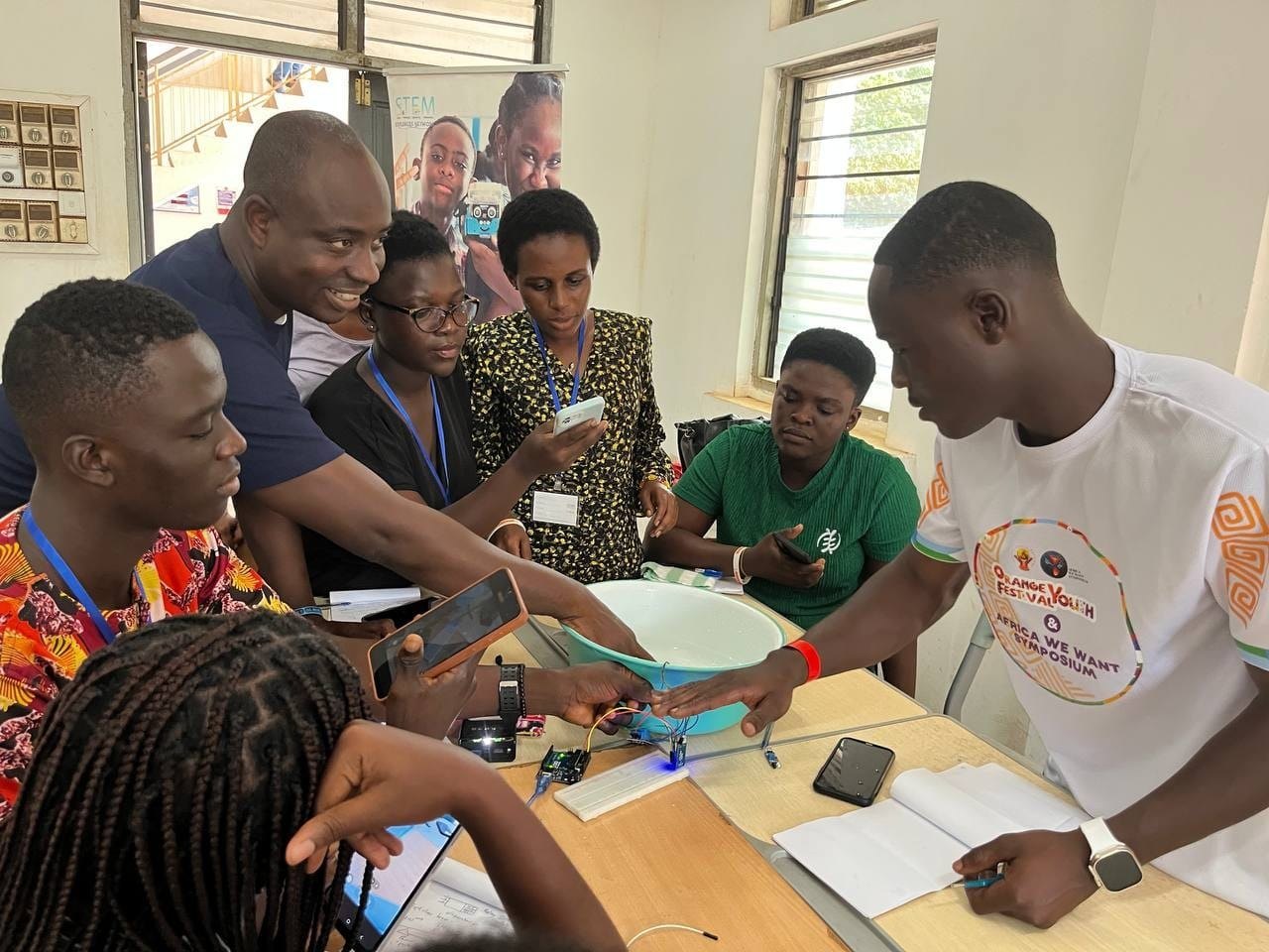 OYF Masterclass participants working with hands-on STEM materials